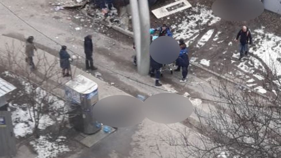 Aftermath of an attack in Kharkiv - dead bodies have been blurred. The BBC, who shared the photo, report that weapons experts believe that cluster bombs were used
