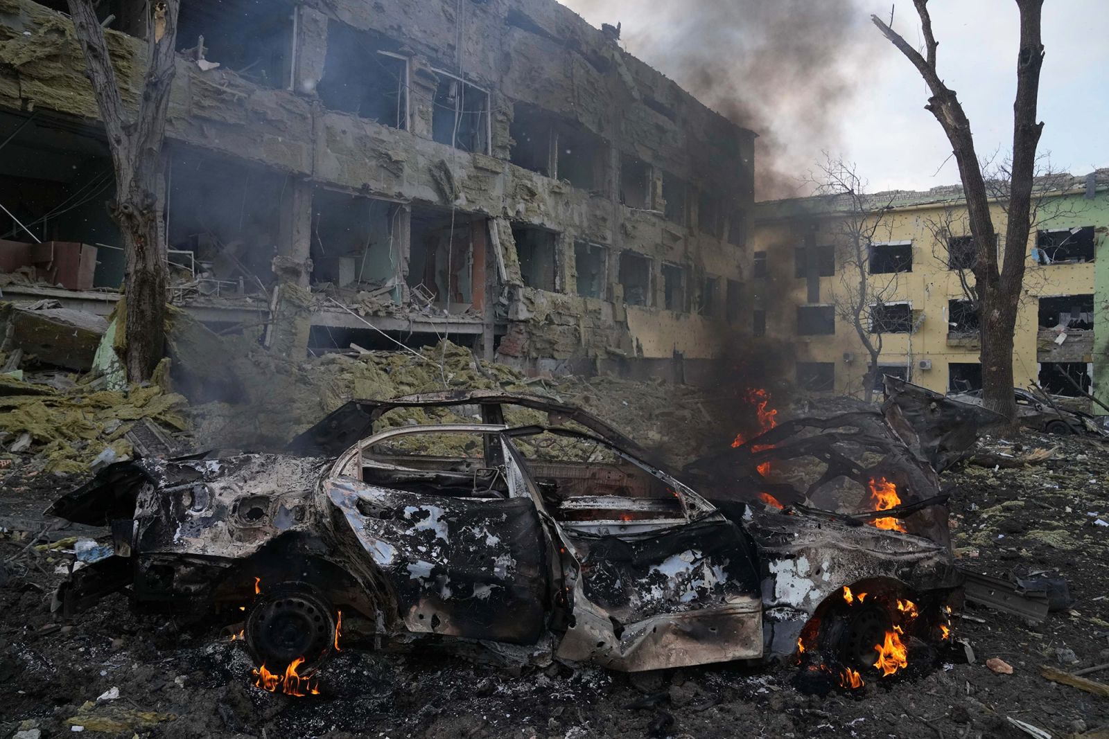 Mariupol A car gutted outside the wreck of the Maternity Hospital Photo Evgeniy Maloletka, Associated Press
