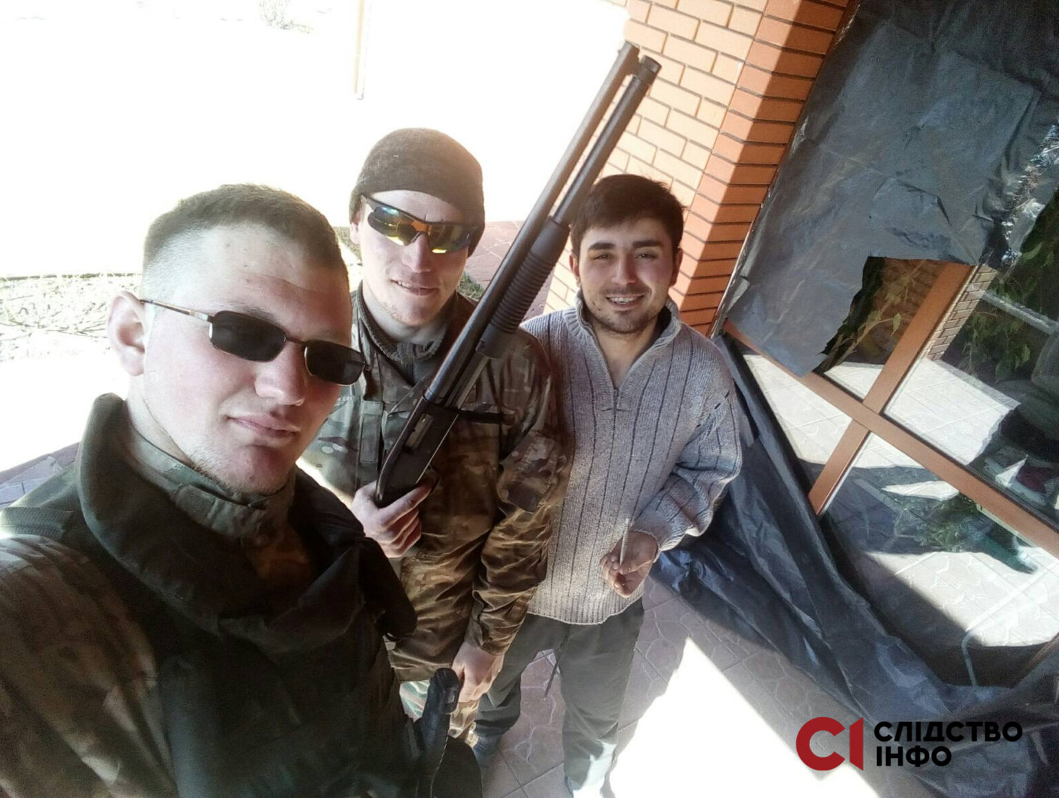 Daniil Frolkin (at the front) with two other members of the 64th motorized infantry brigade taken on the phone he stole Photo posted by Slidstvo