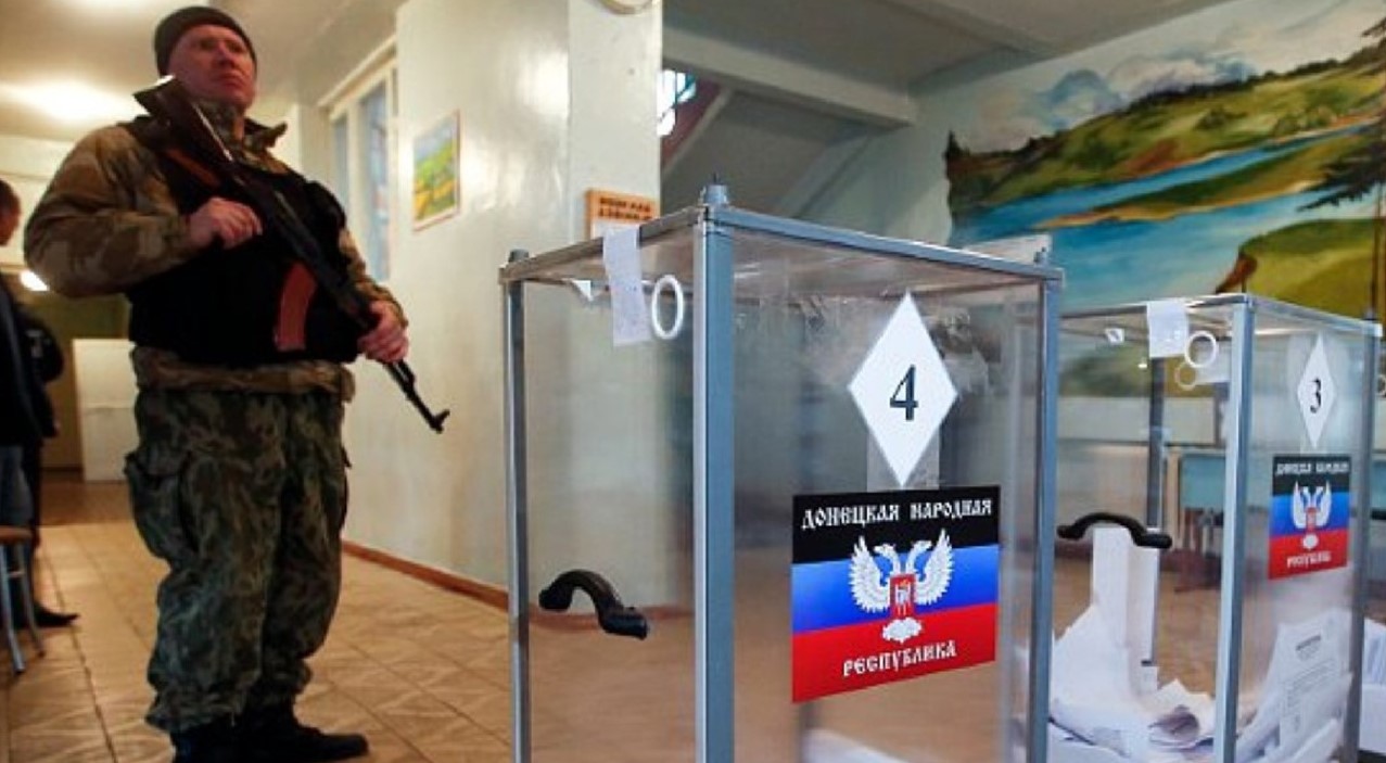 Fake ’referendum’ on occupied territory with armed Russian invaders either ’overseeing ballot boxes’ or accompanying collaborators as they went around people’s homes, threatening them into ’voting’ Photo posted by armyinform.ua