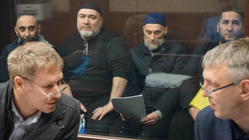 From left Rustem Taiirov, Dzebbar Bekirov, Rustem Murasov and Zavur Abdullayev in court Photo Crimean Solidarity