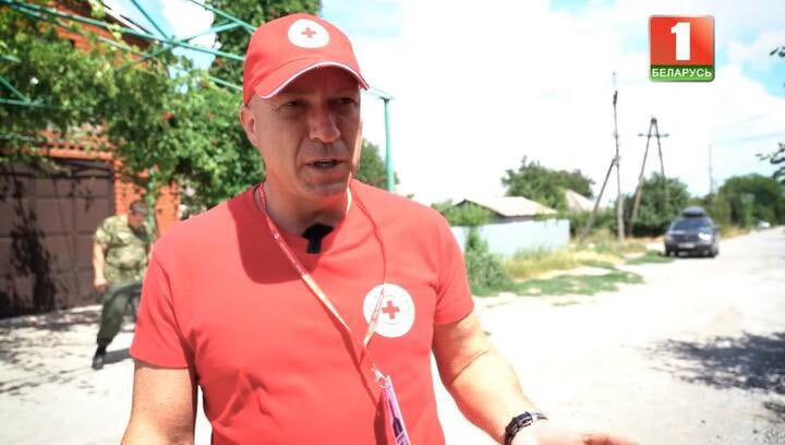Dzmitry Shoutsou, head of the Belarusian Red Cross taking part in an overtly propagandist film on Belarus 1 Screenshot from the video