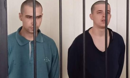 Ukrainian POWs Pavlo Artemenko and Anton Romaniuk From the so-called ’court