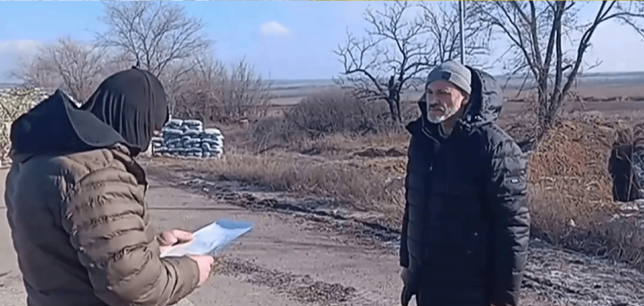Oleksiy Brazhnyk on the staged video in which the Russian invaders were supposedly ’deporting’ him to governmnent-controlled Ukraine. He has not been seen since then