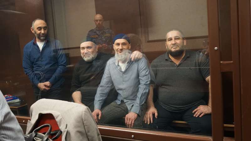 From left Rustem Taiirov, Dzebbar Bekirov, Ruslan Murasov and Zavur Abdullayev in court Photo Crimean Solidarity