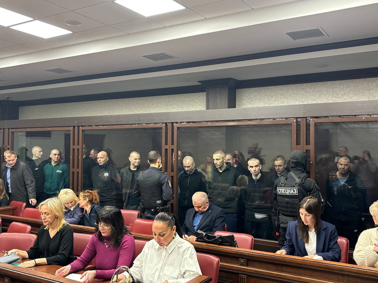 All the men in the court cage on 17 October 2025 Photo Southern District Military Court press service